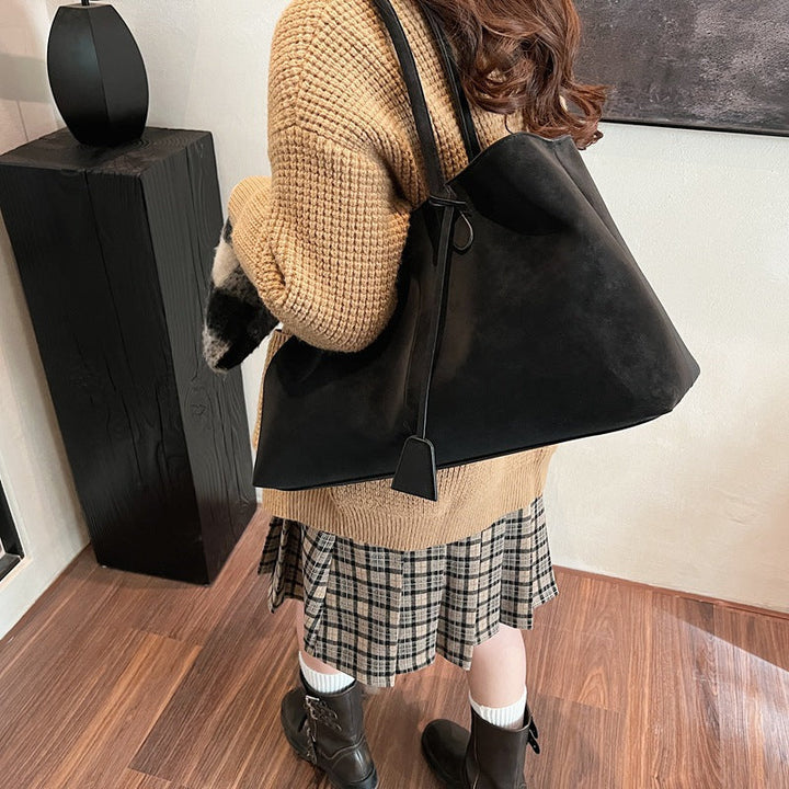Gilded Crest Handbag