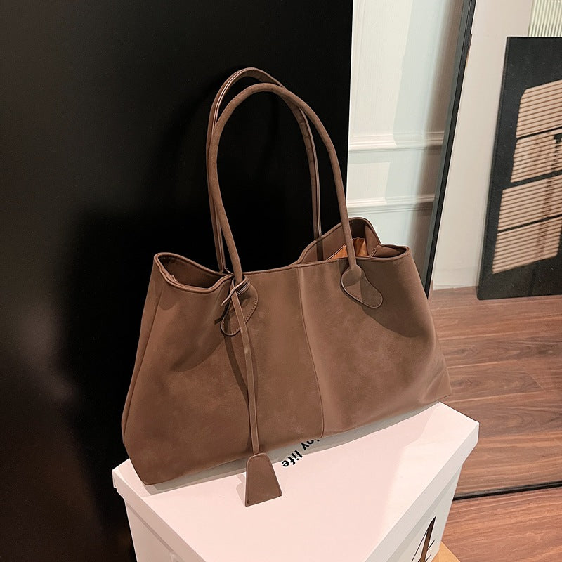 Gilded Crest Handbag