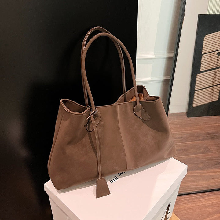 Gilded Crest Handbag